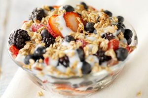 Breakfast berries with granola and organic yoghurt